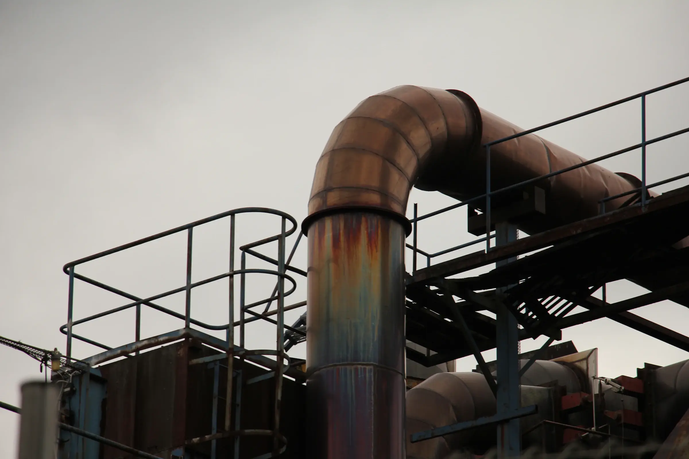 Close-up of corroded steel pipework