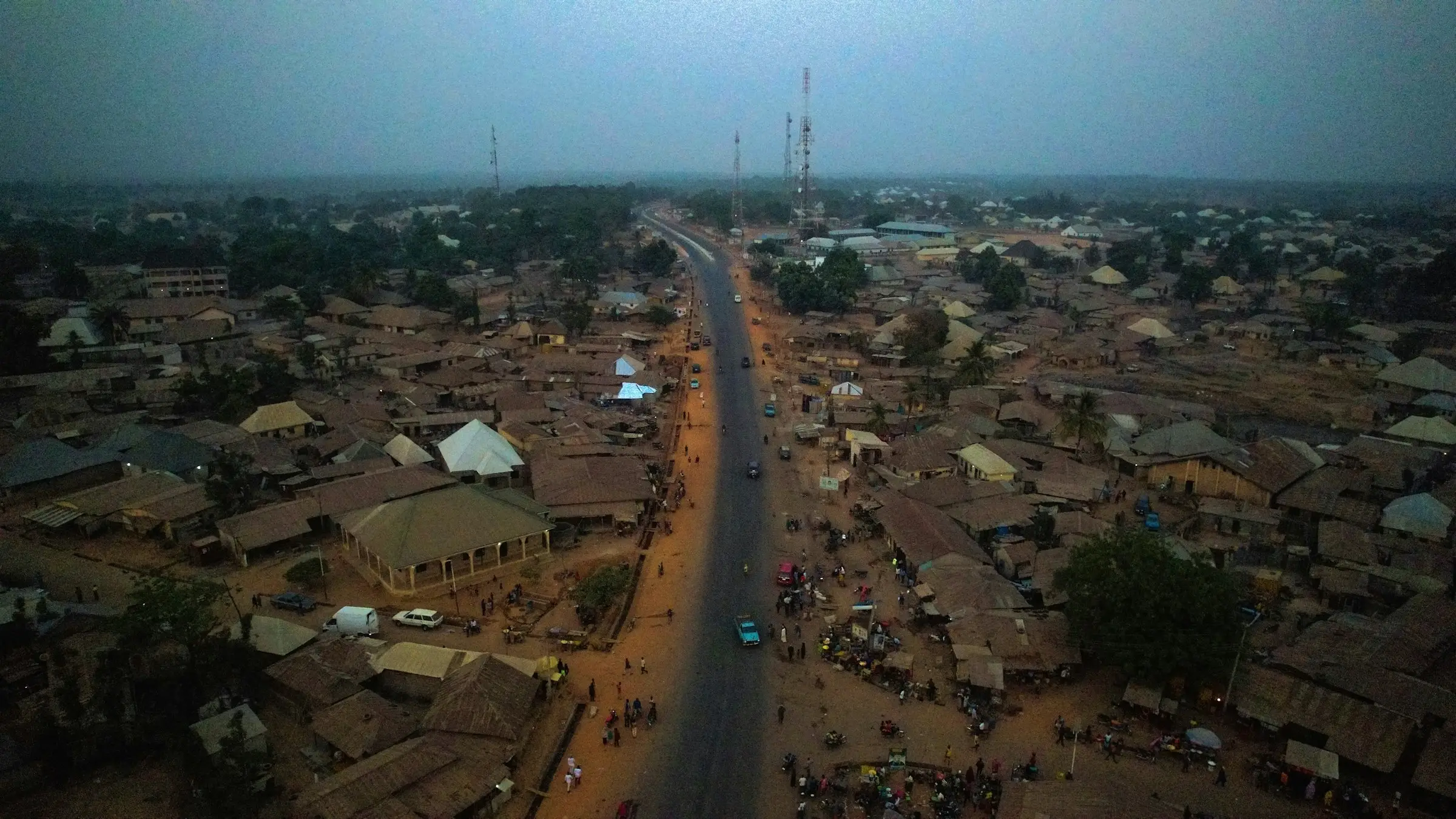 Aerial view of a Nigerian town and the road running through it